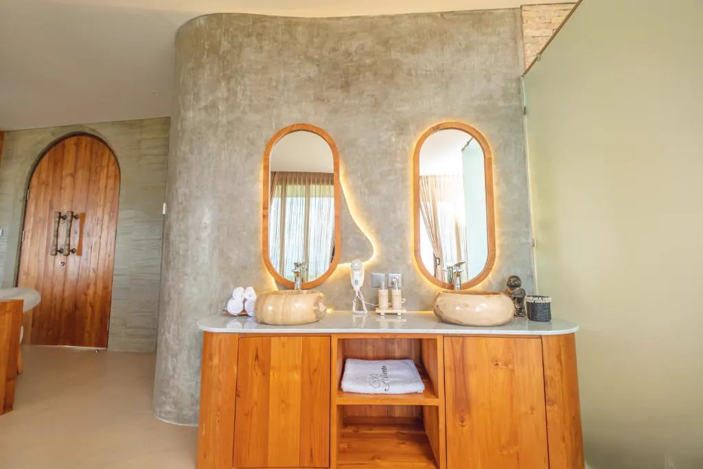Double vanity with lit mirrors