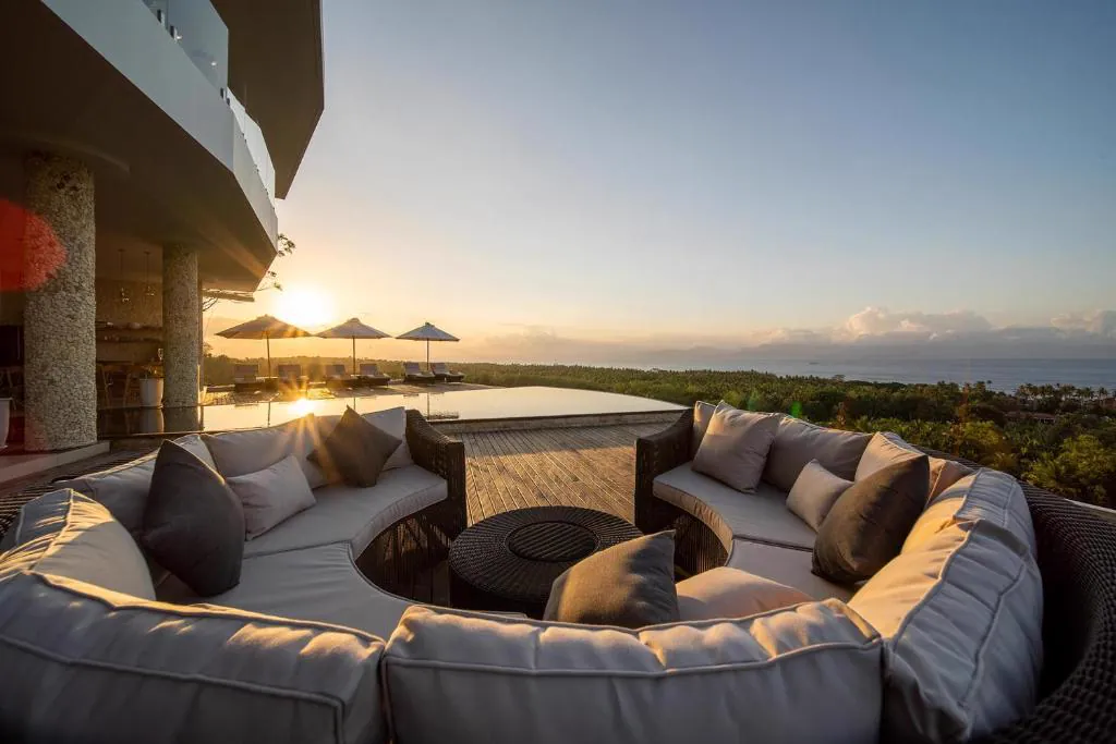 Outdoor lounge on the deck at sunset