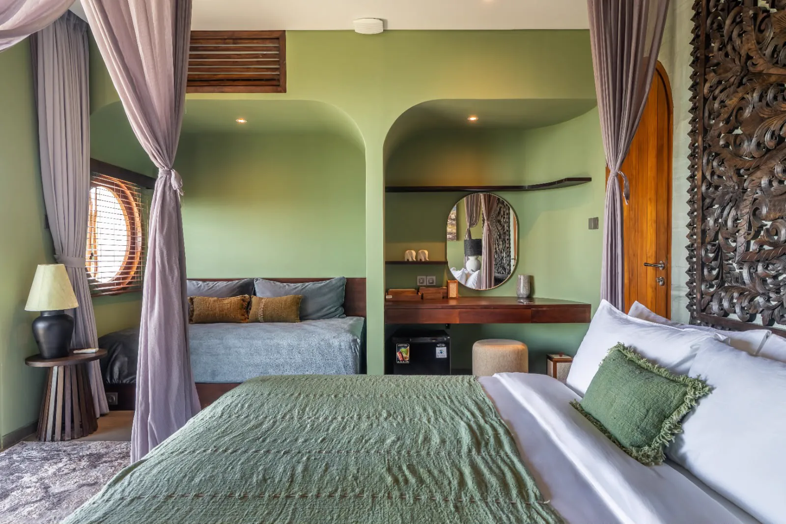 Bedroom with canopy bed, daybed and vanity